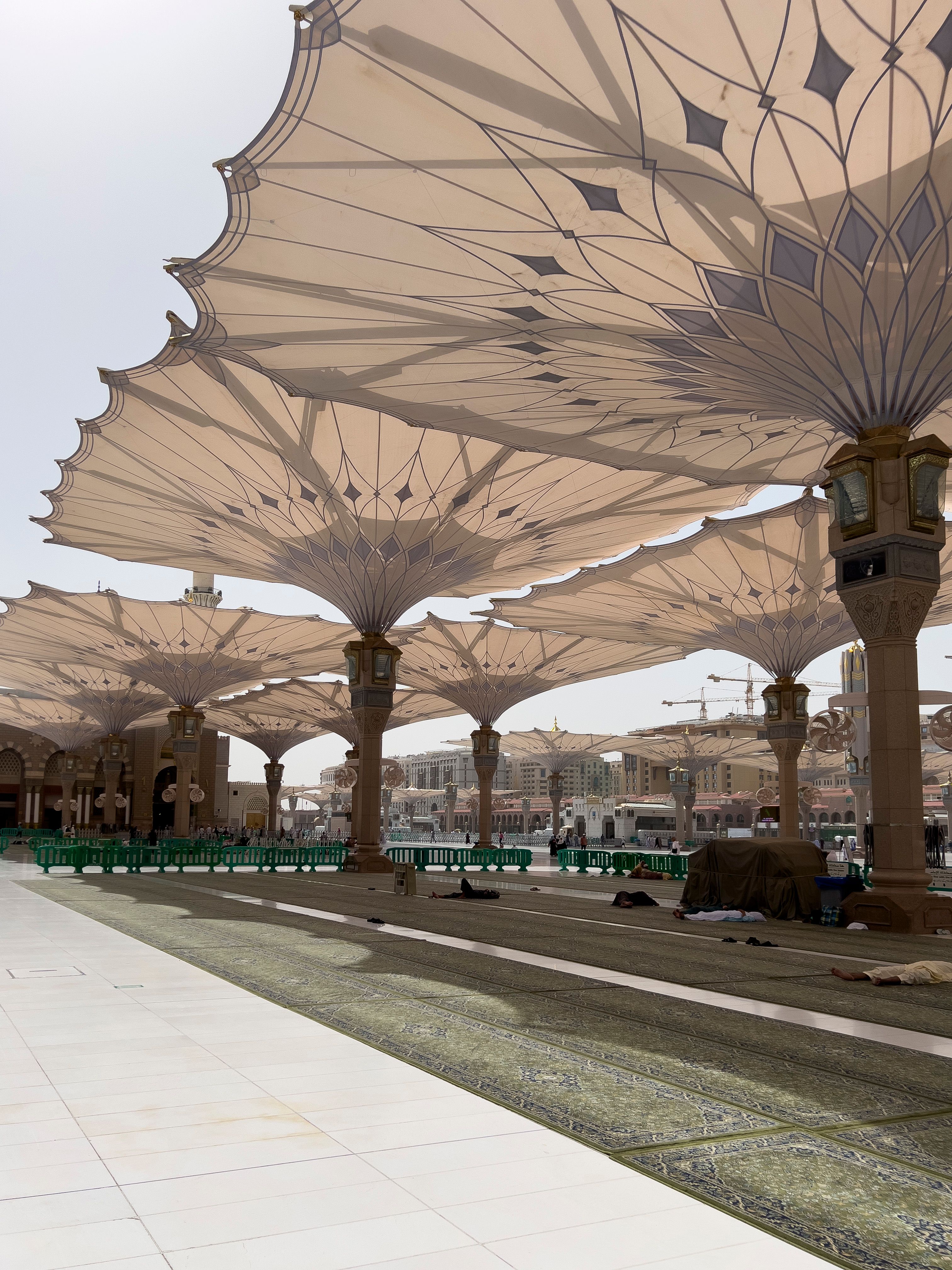 An aerieal view of the Prophet's mosque with its umbrellas, minarets and the Green Dome showing